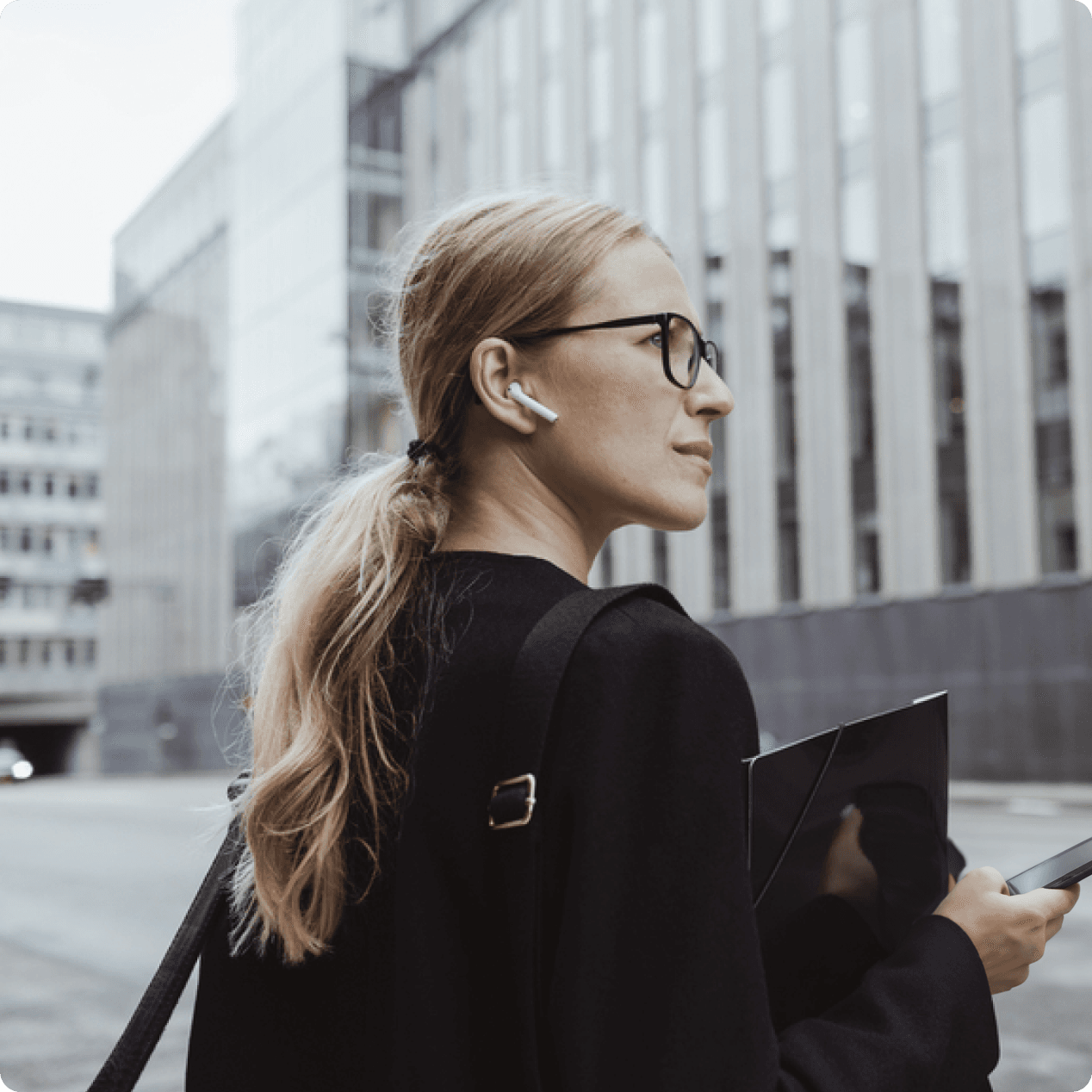 Woman walking across road