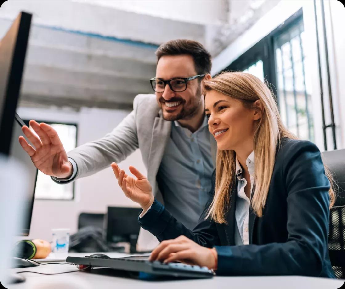 Man researching Kyriba payments on laptop.